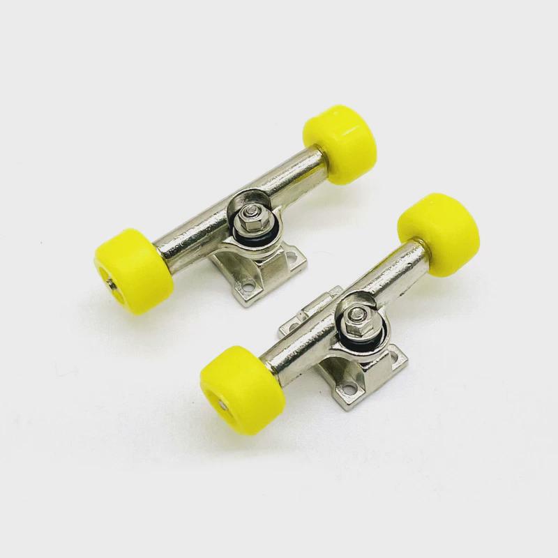 A pair of yellow wheels and a bridge